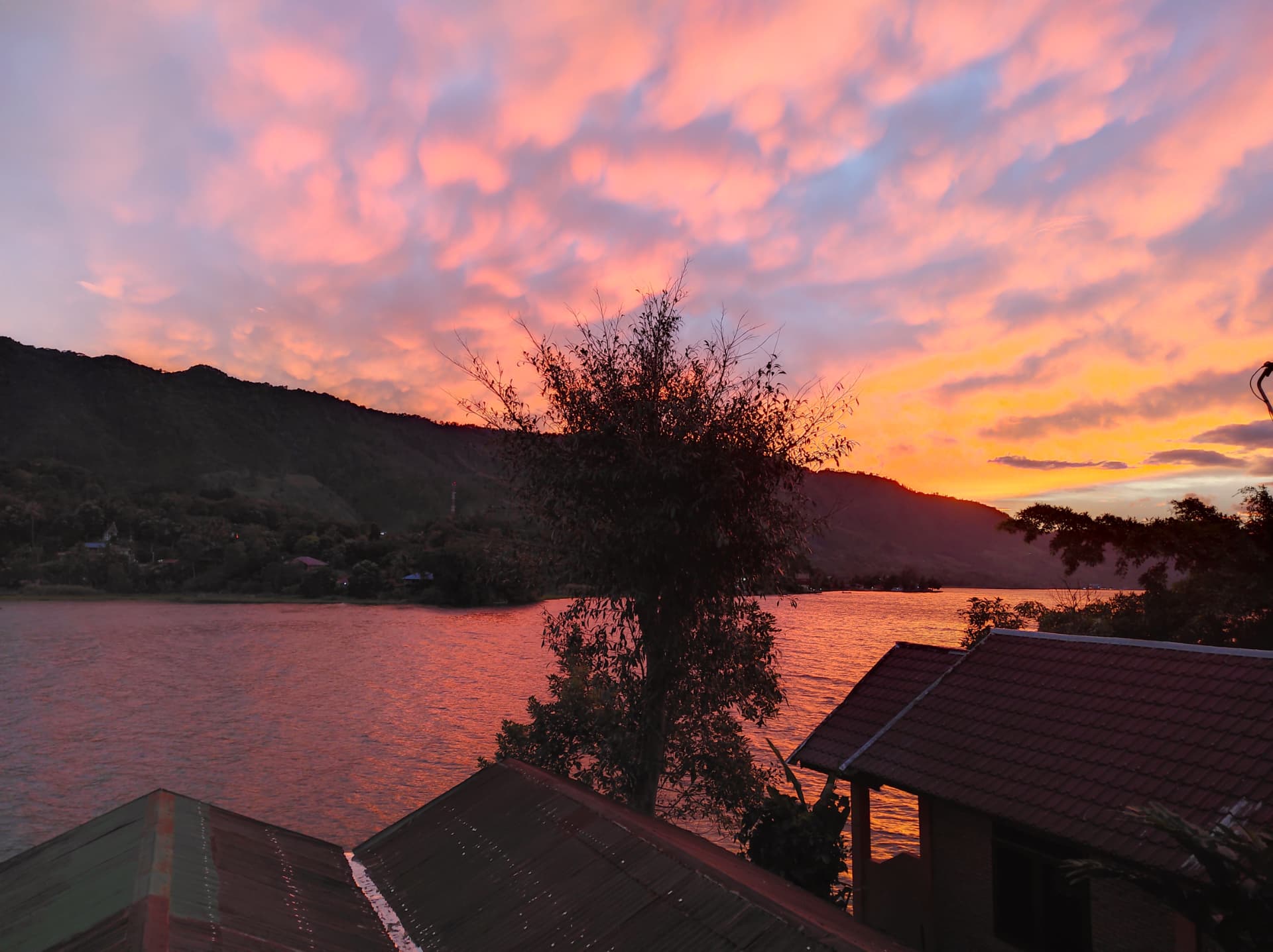 Sunset over Lake Toba seen from the café